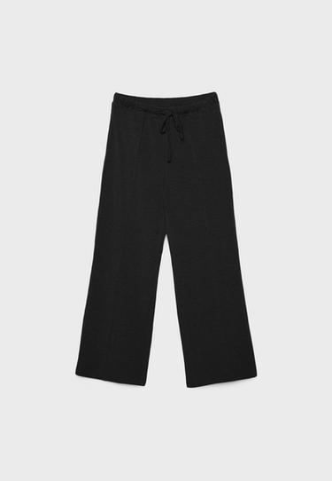 Soft-touch wide-leg jogger trousers with pin tuck — Black 7