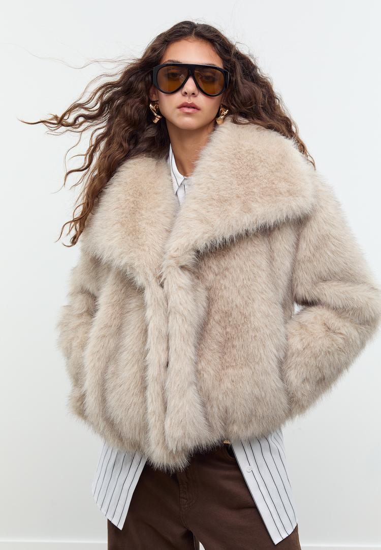 blouson court en fausse fourrure