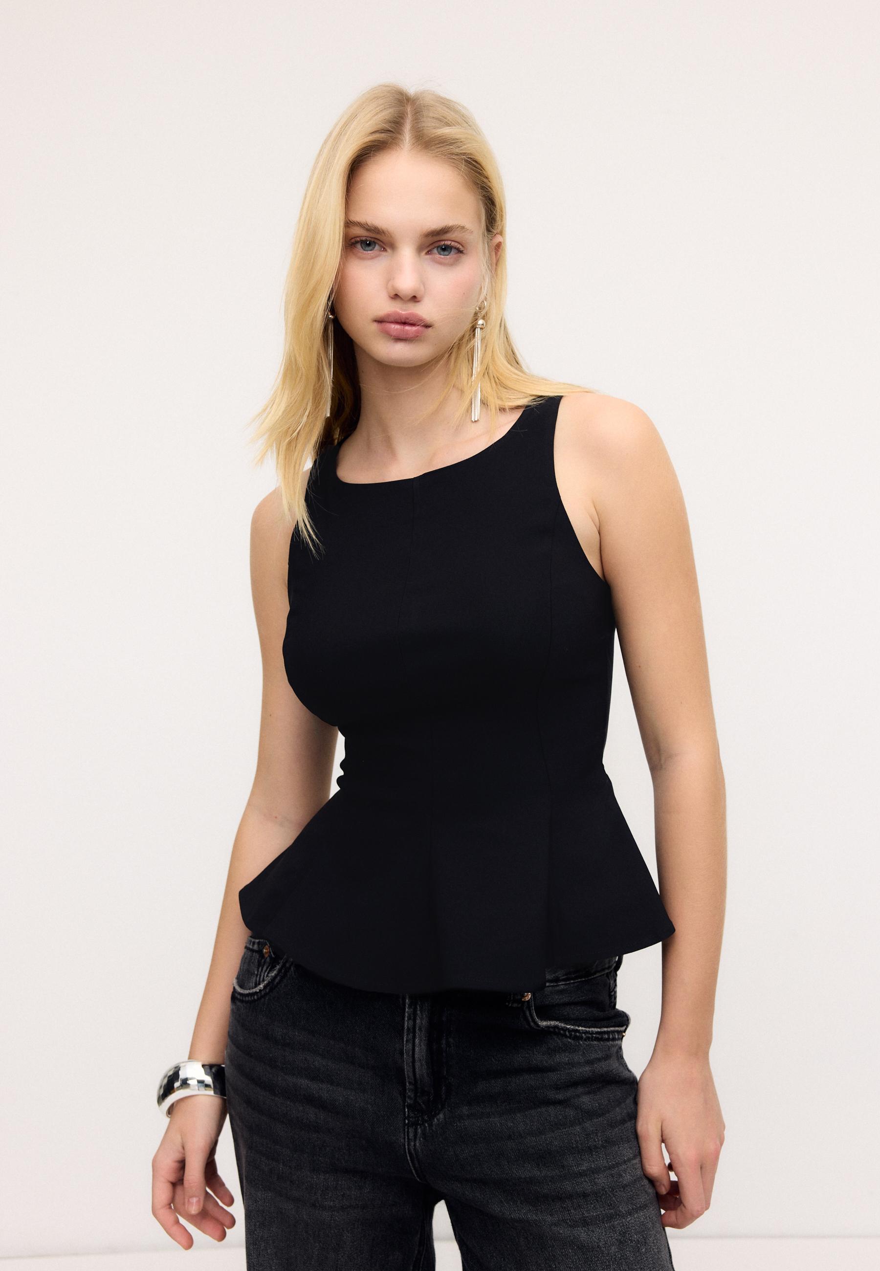 Sleeveless peplum top — Black