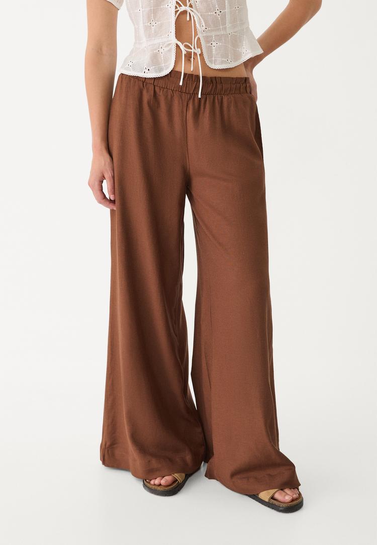 pantalon palazzo fluido con lino