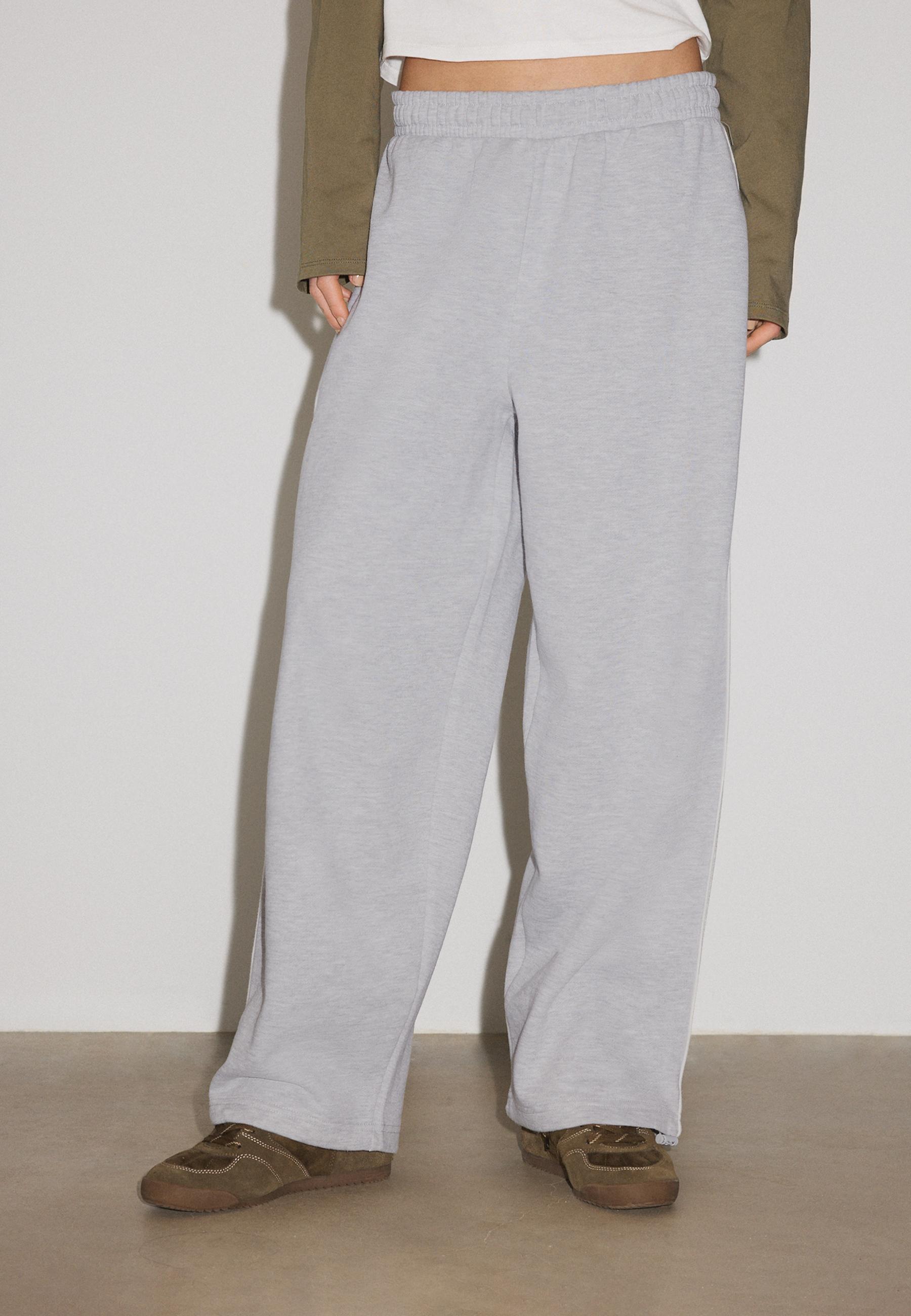Plush joggers with piping and toggles — Grey melange
