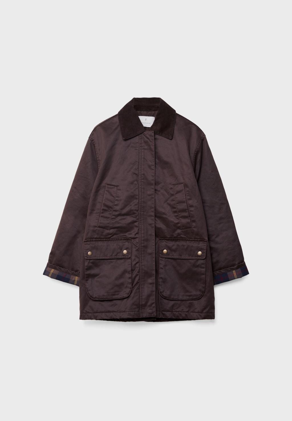Waxed parka with multiple pockets