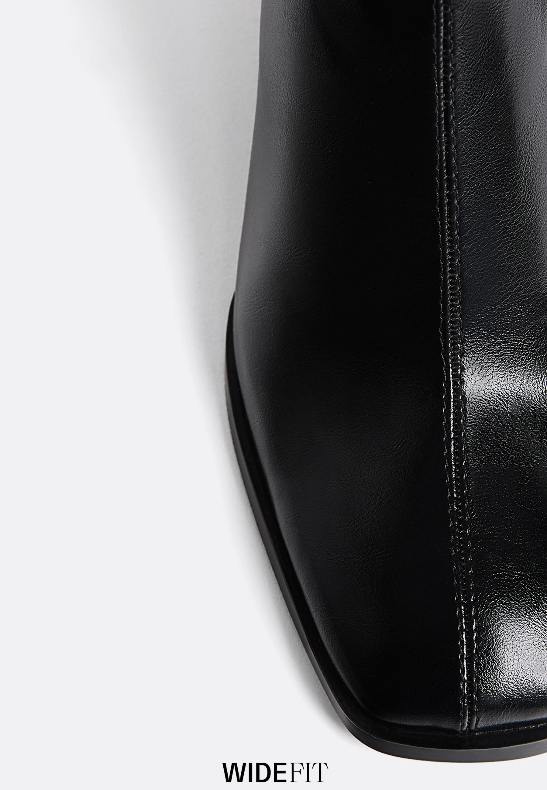 Mid-heel boots with stretch legs — BLACK