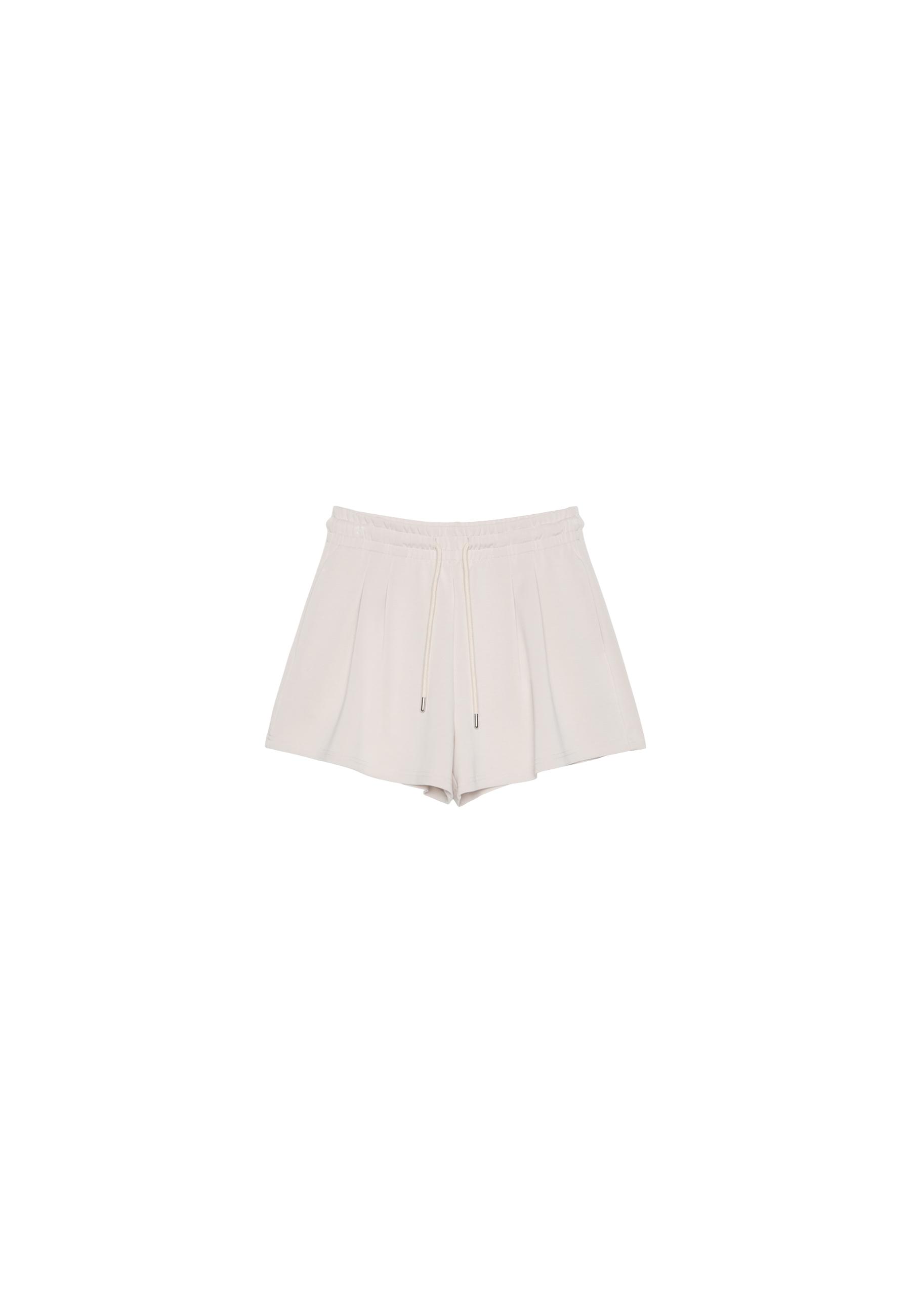 Soft-touch shorts with darts — Stone