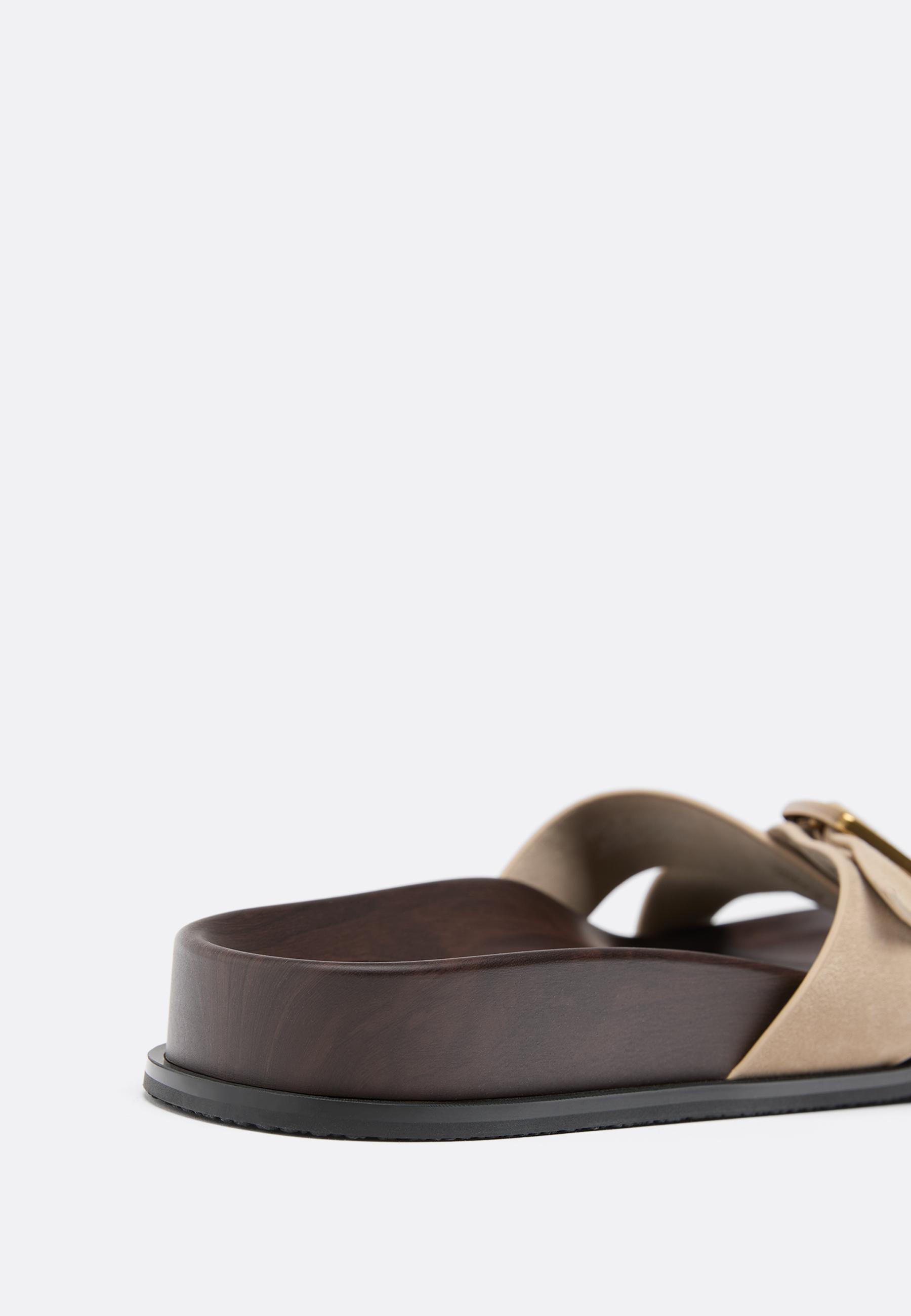 Flat crossed leather sandals — BEIGE