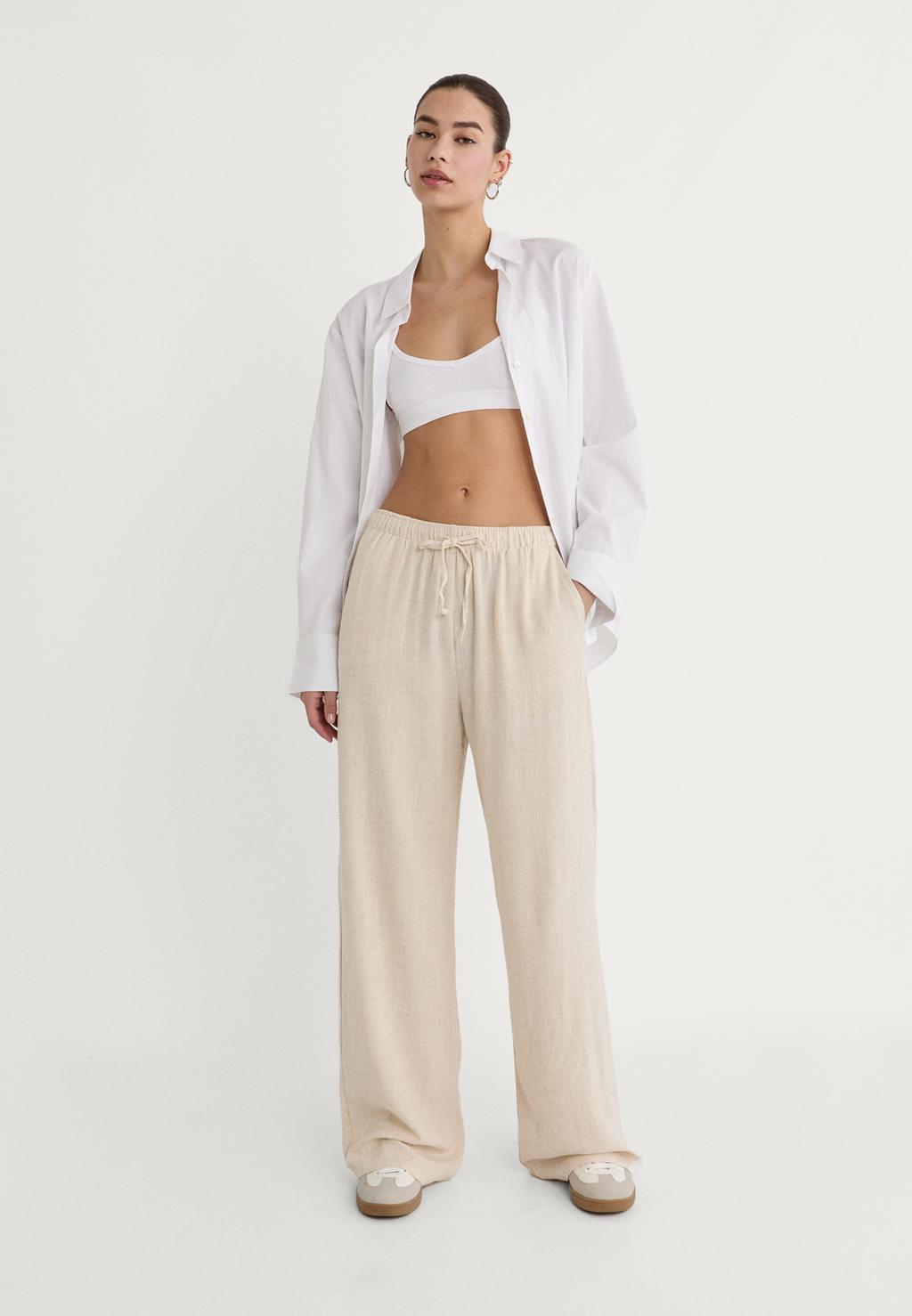 Loose-fitting linen blend trousers