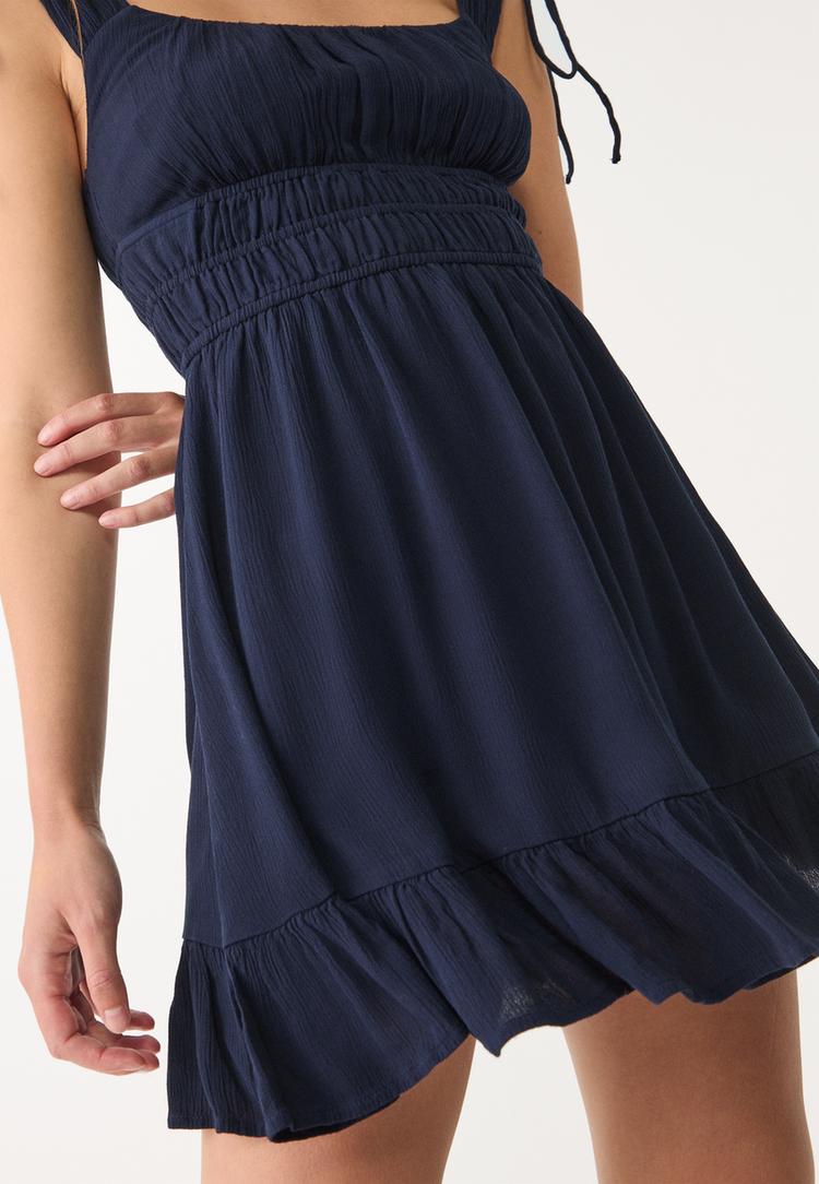 vestido corto fluido
