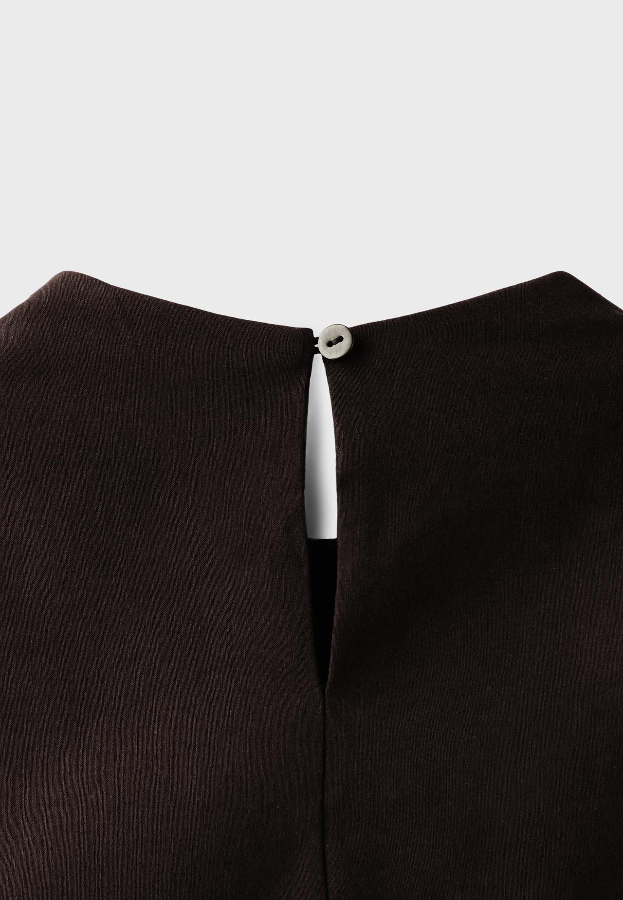 Sleeveless peplum top with high neck — Brown