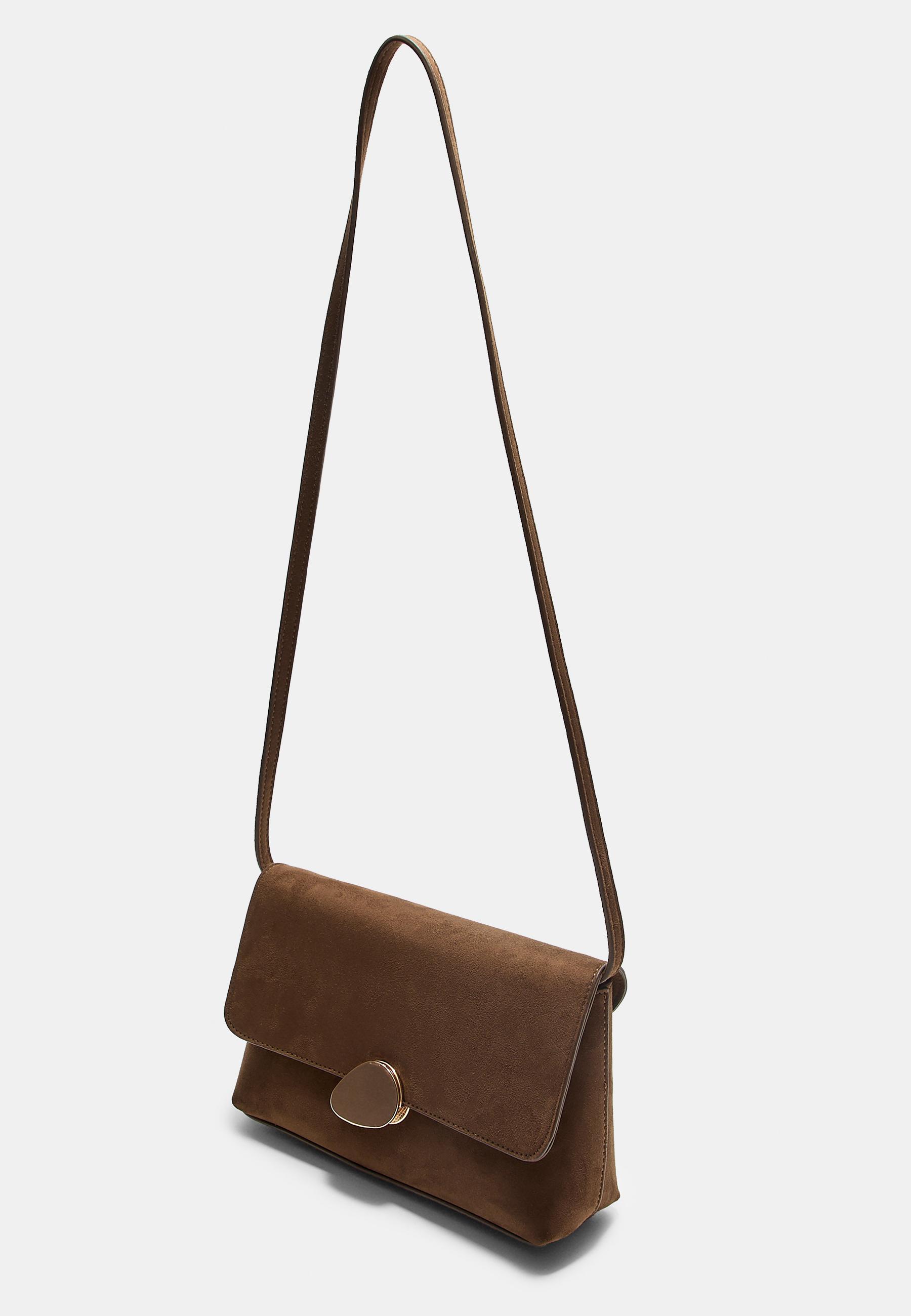 Asymmetric faux suede bag with metal clasp — Brown