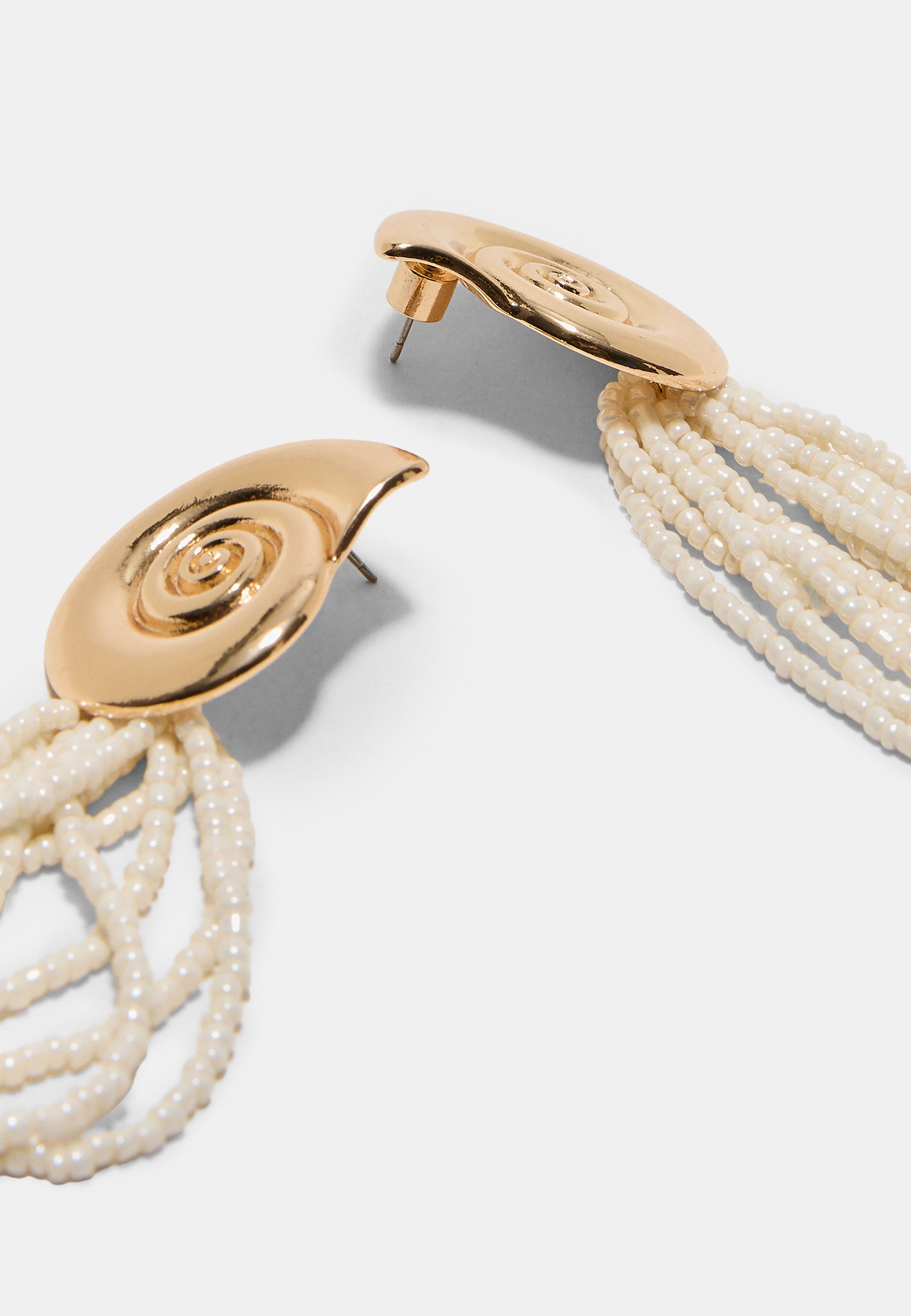 Seashell cascading earrings — Gold
