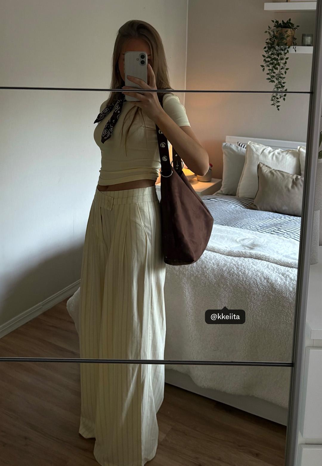 Faux suede bucket bag with strap detail — Brown