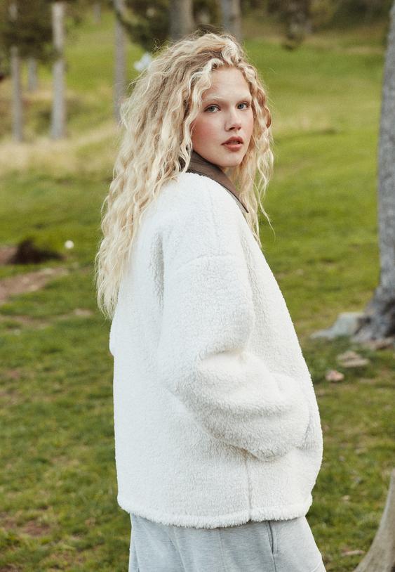 combinatiejack met omkeerbaar synthetisch teddy effect