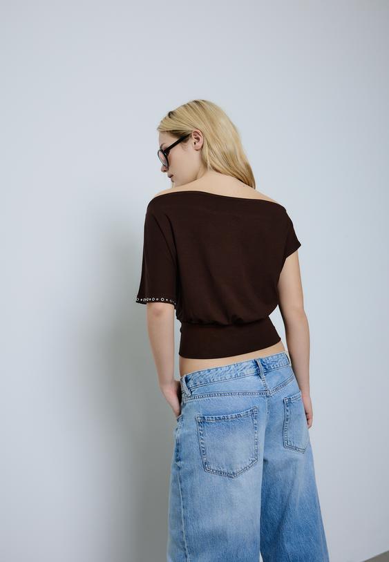 maglietta asimmetrica borchie