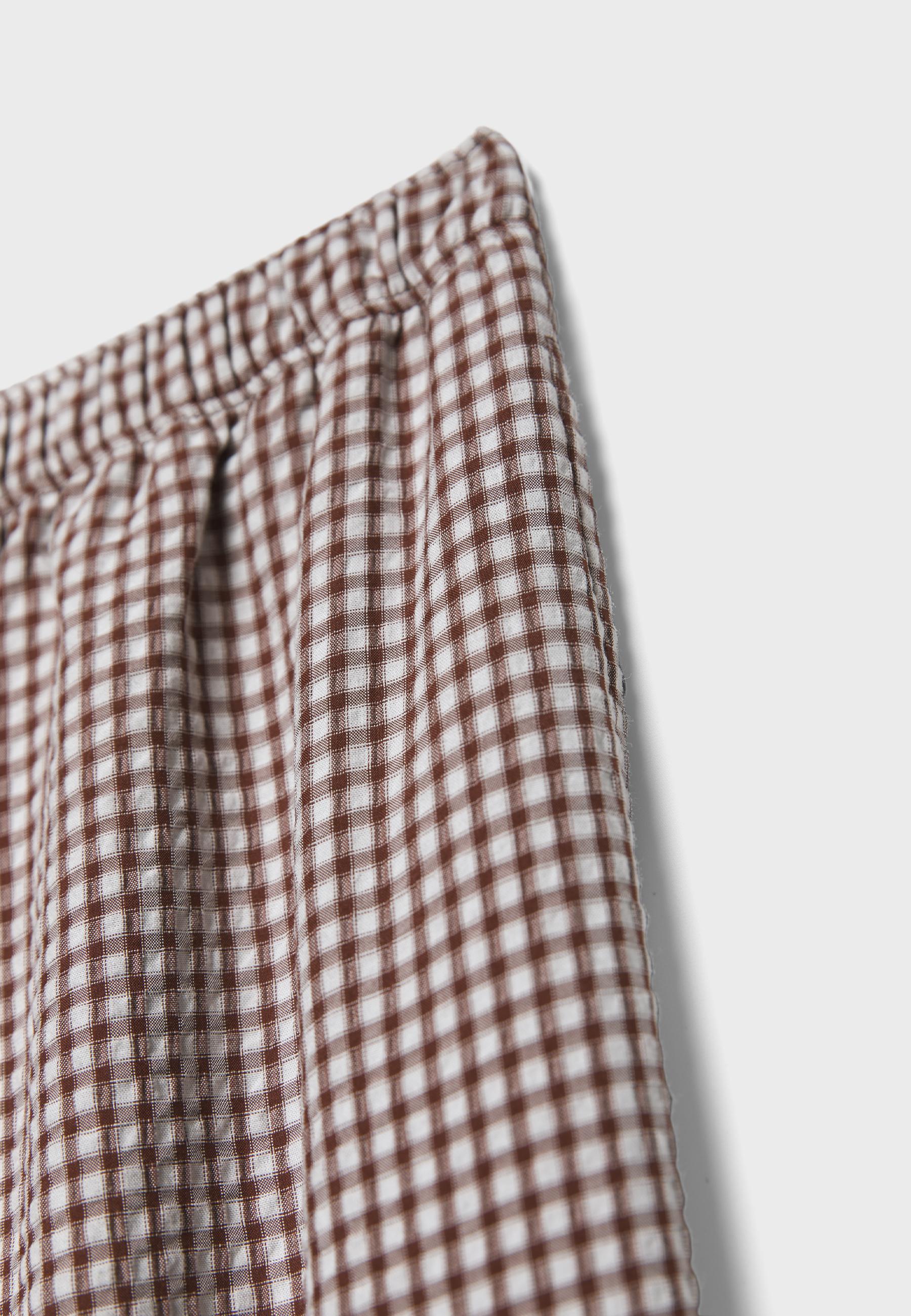 Checked print voluminous trousers — Terracotta
