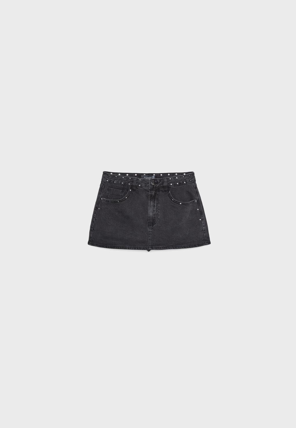 D62 Falda pantalón denim tachas