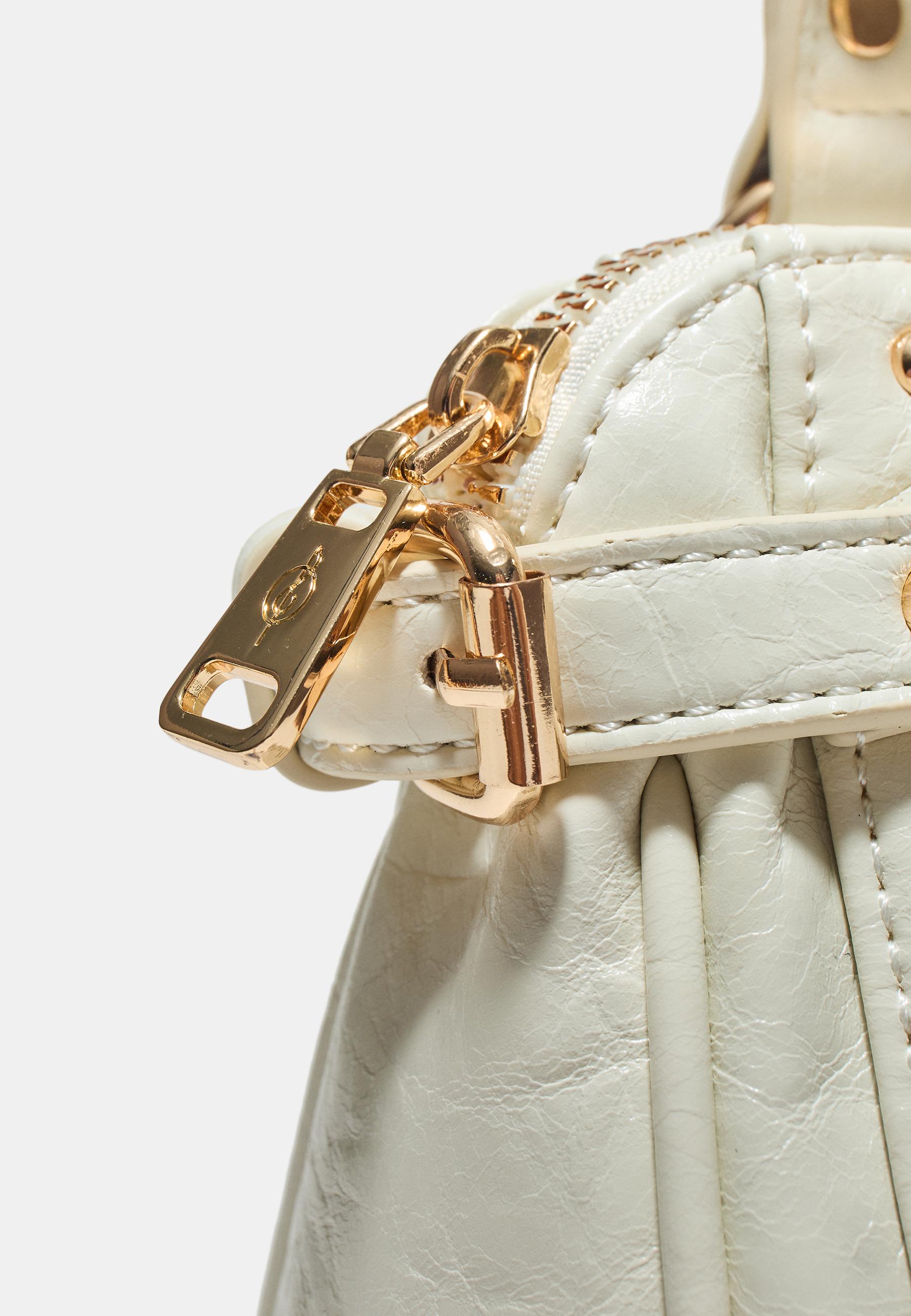 Studded pocket crossbody bag — Ecru