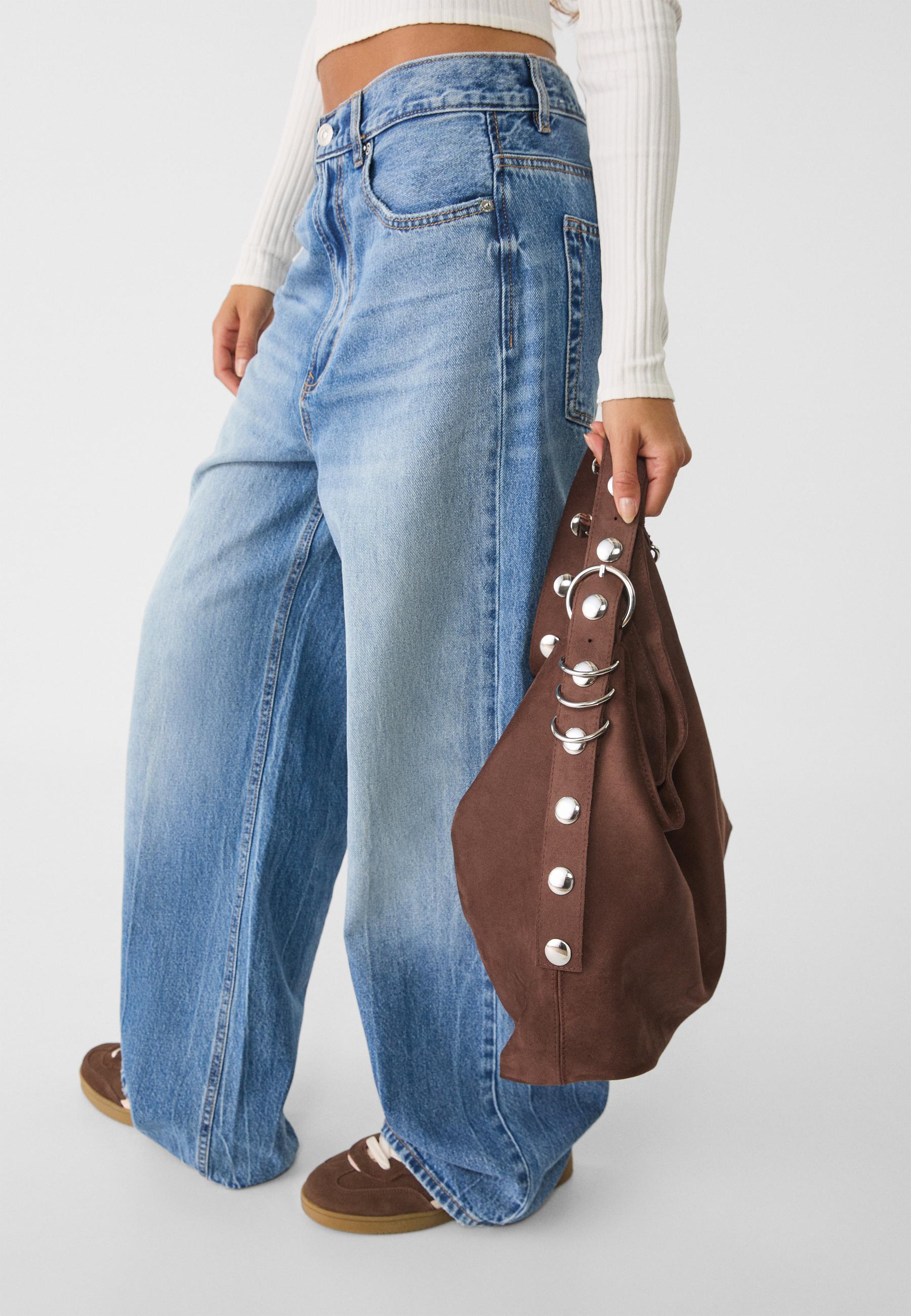 Faux suede bucket bag with strap detail — Brown