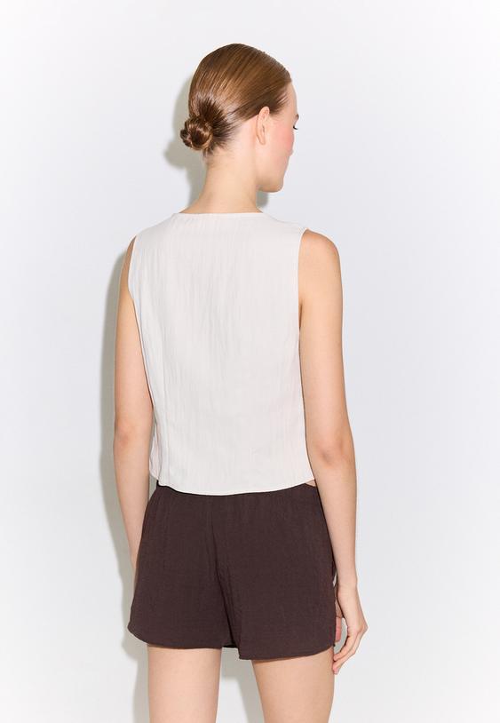 gilet regular con bottoni