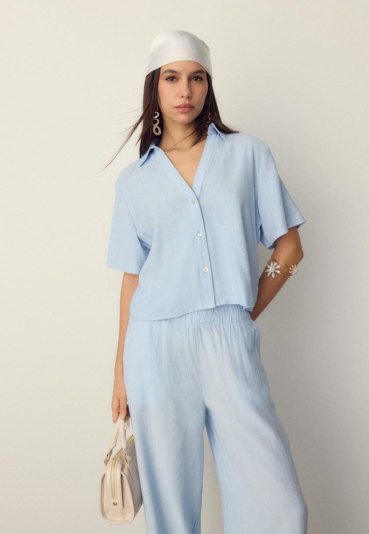 soepelvallend overhemd met knopen