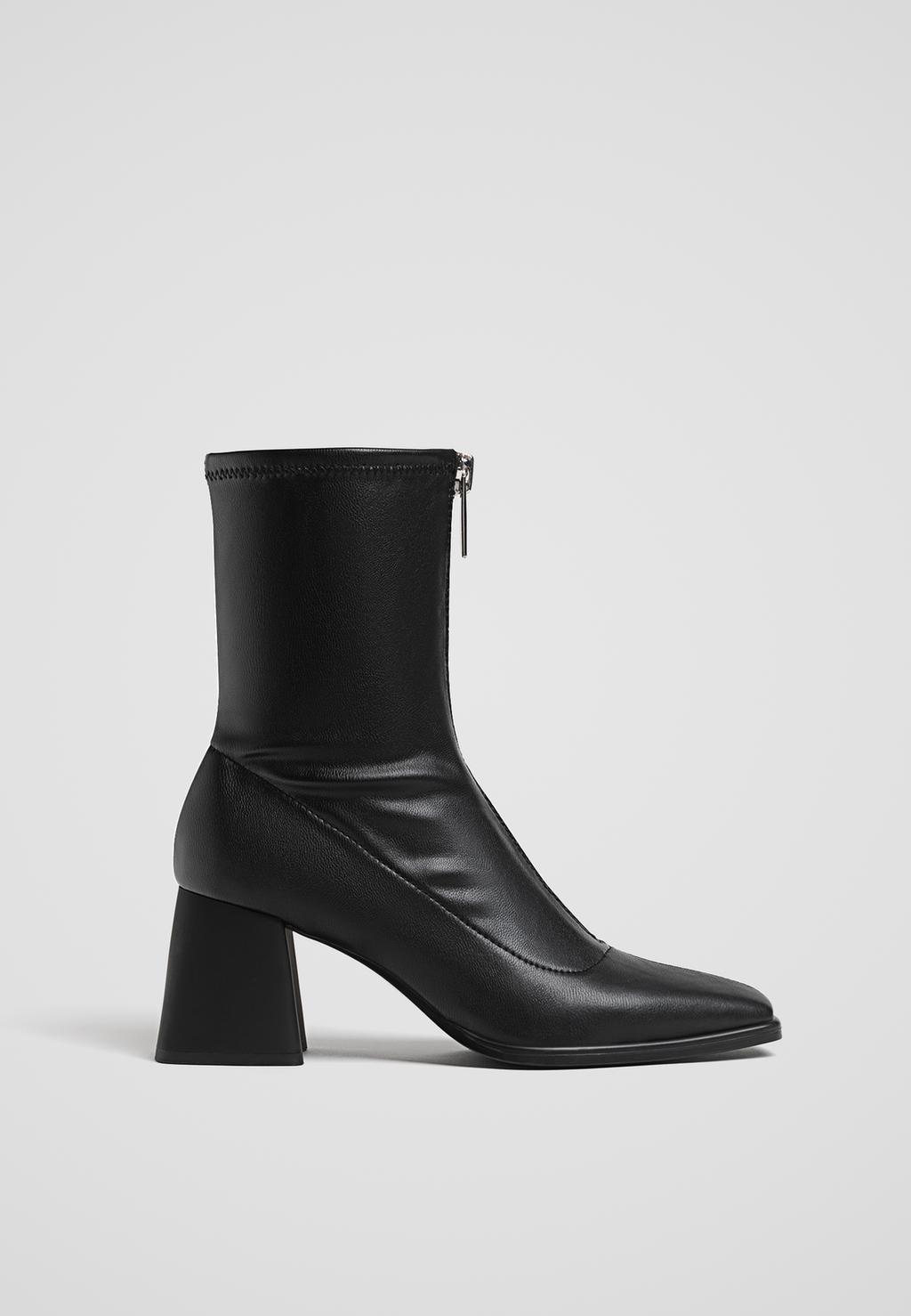 High-heel ankle boots with front zip