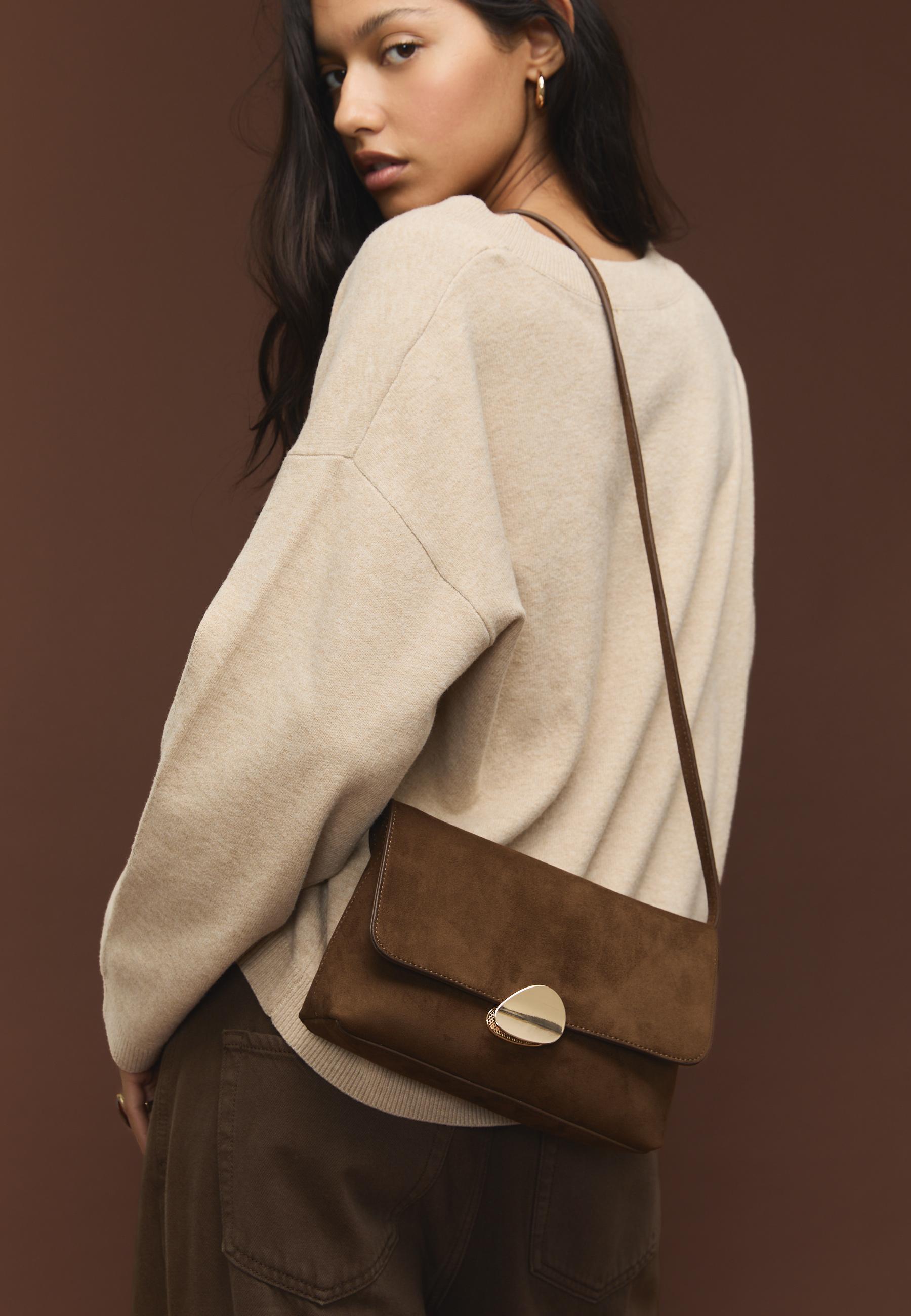 Asymmetric faux suede bag with metal clasp — Brown