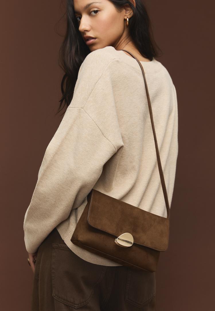 sac en suedine a fermeture metallique asymetrique