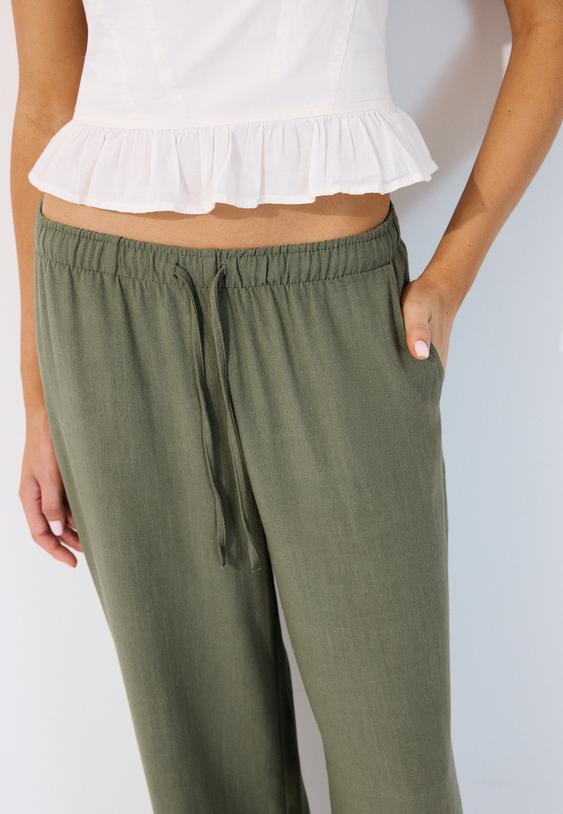 pantaloni dritti effetto lino