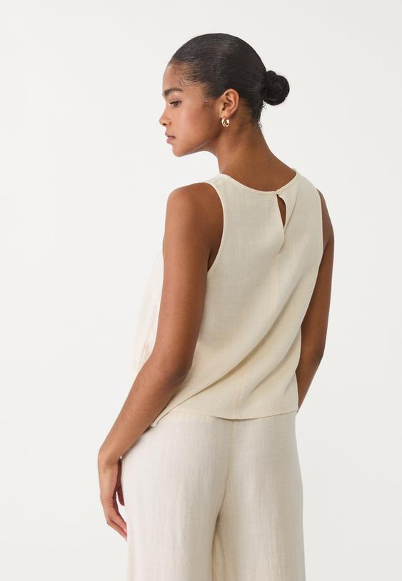 top nadadora fluido con lino