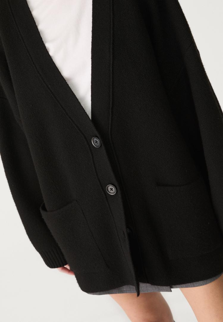 chaqueta punto larga bolsillos
