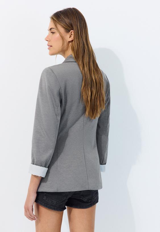 veste basique en maille rayee