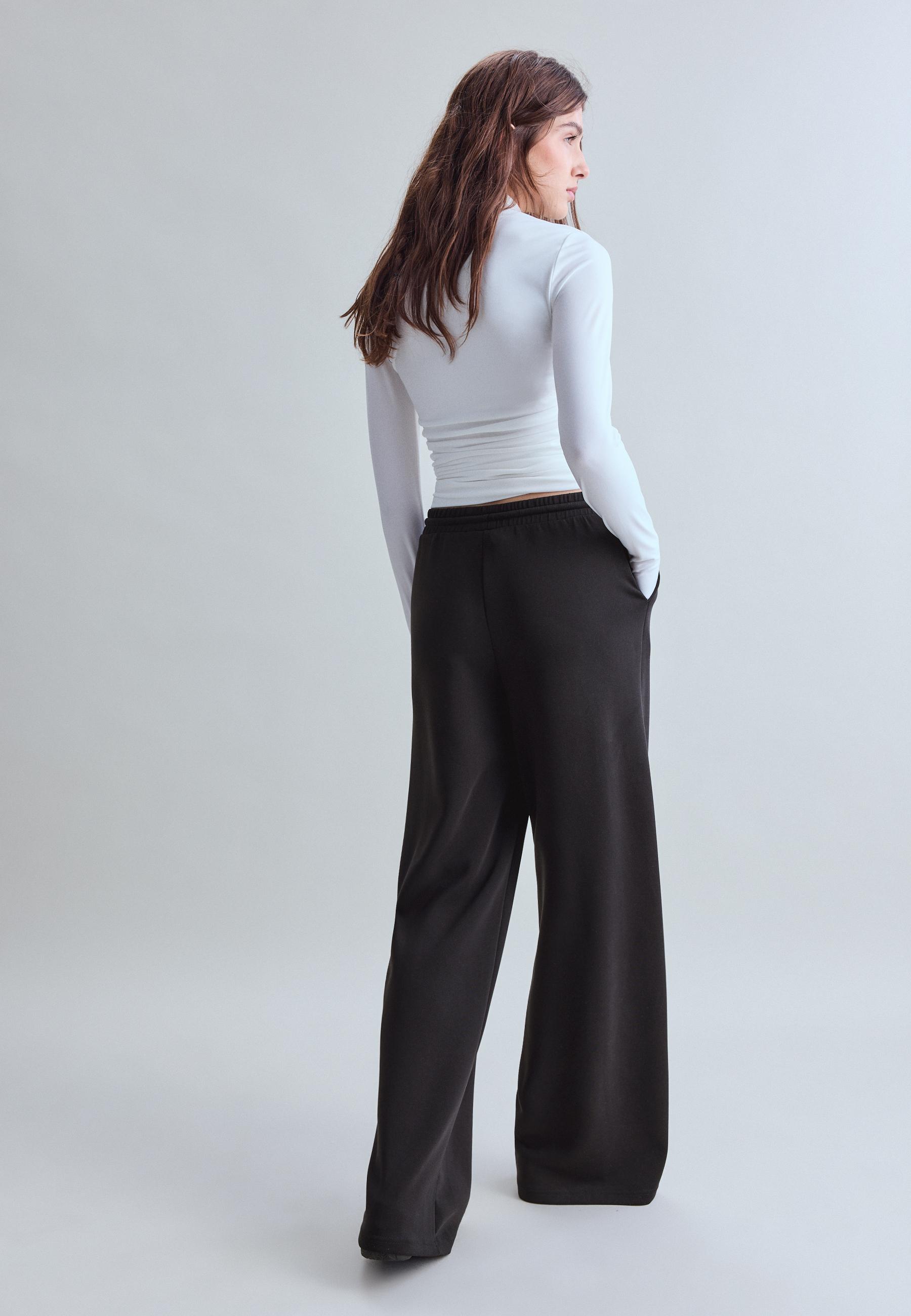Soft-touch palazzo joggers — Black