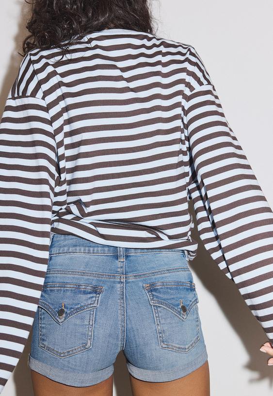 short denim bajo vuelto