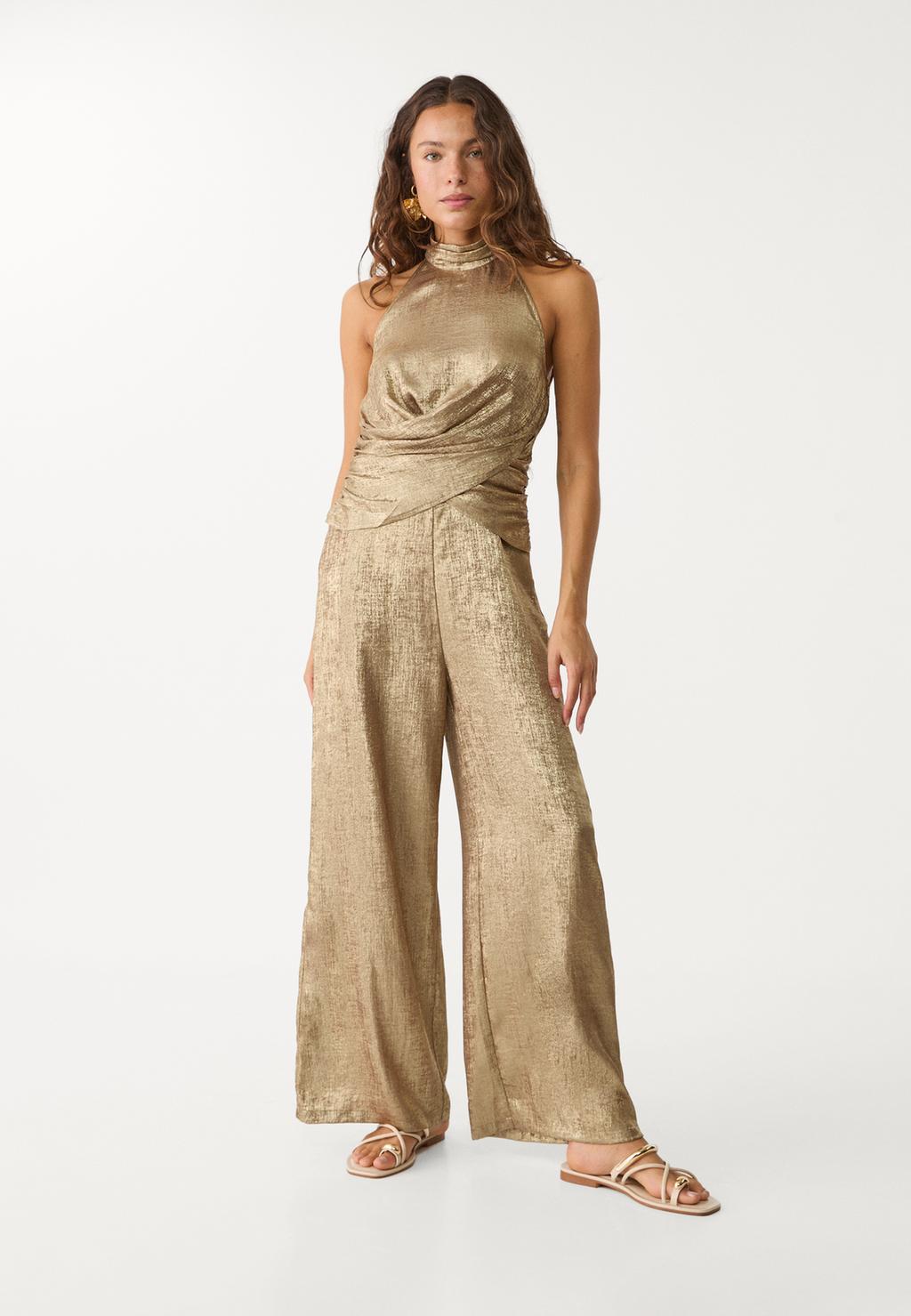 Flowing metallic halter neck jumpsuit