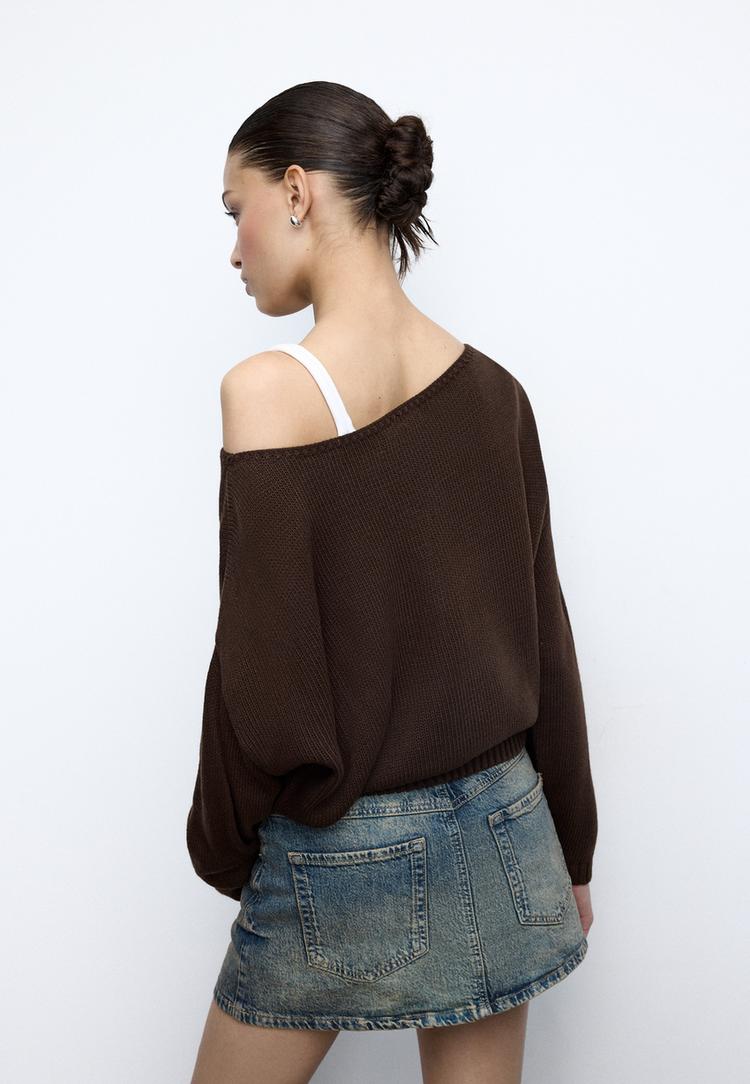 jersey de punto asimetrico estrella