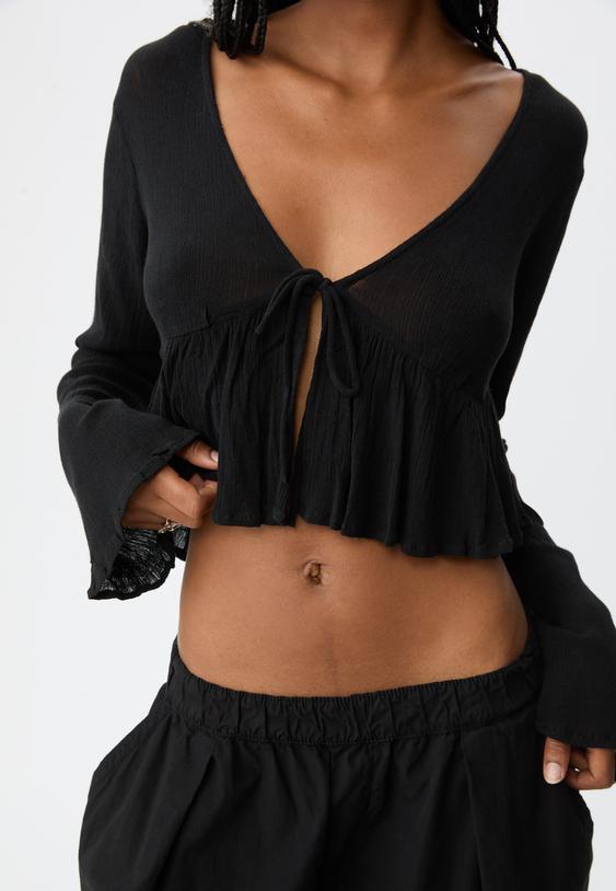 ruffled shirt with tie detail