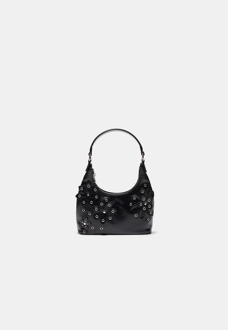 borsa a spalla con fiori e occhielli