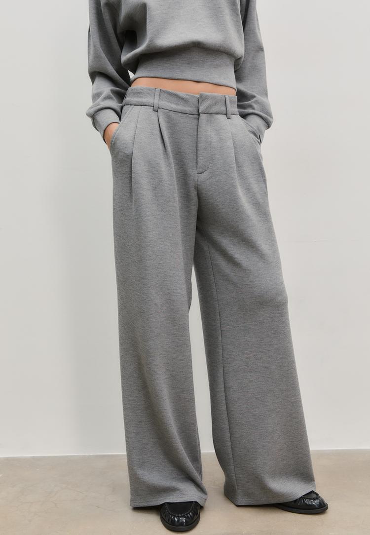 pantalon de ville toucher