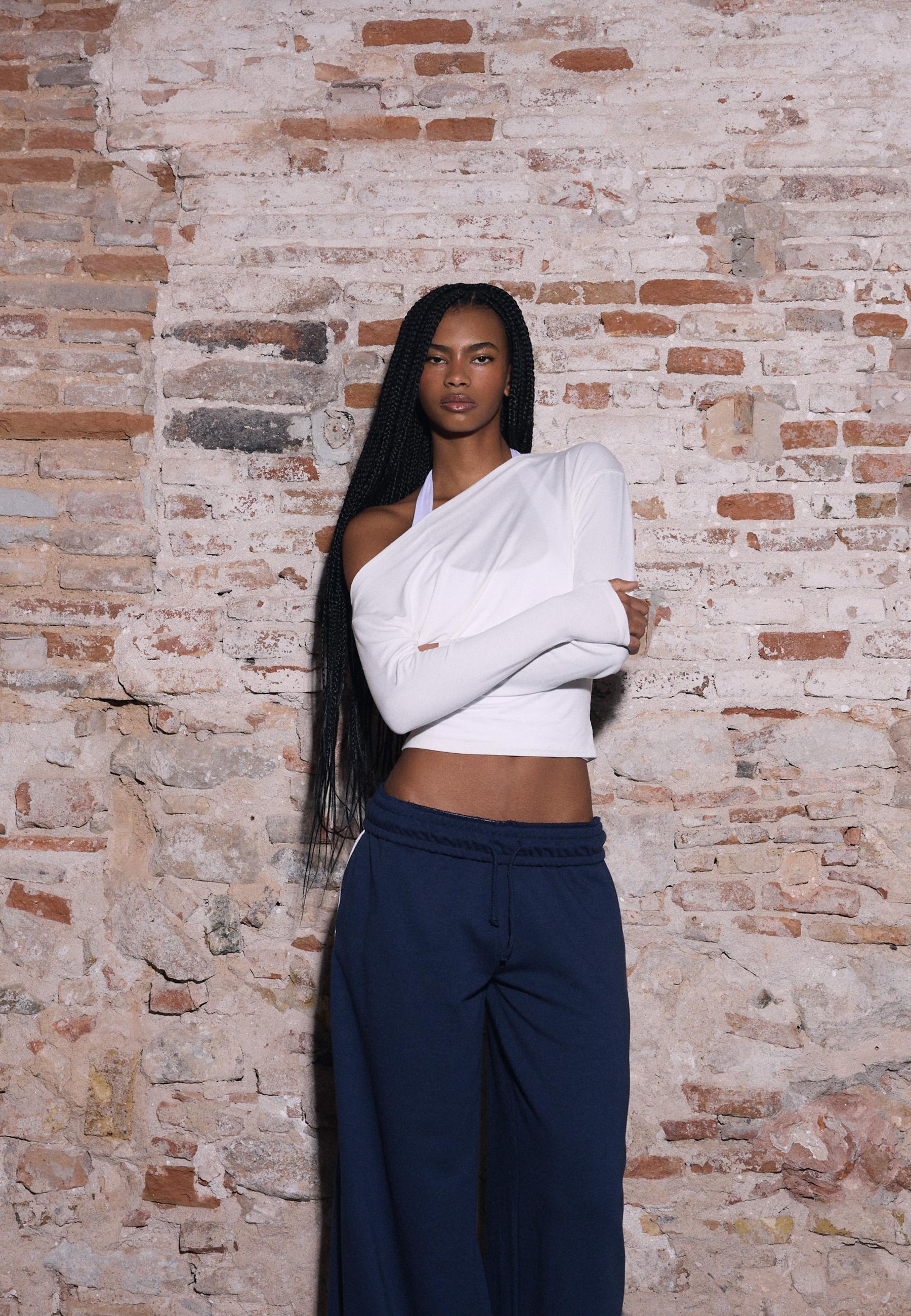Asymmetrical neckline top — Ecru