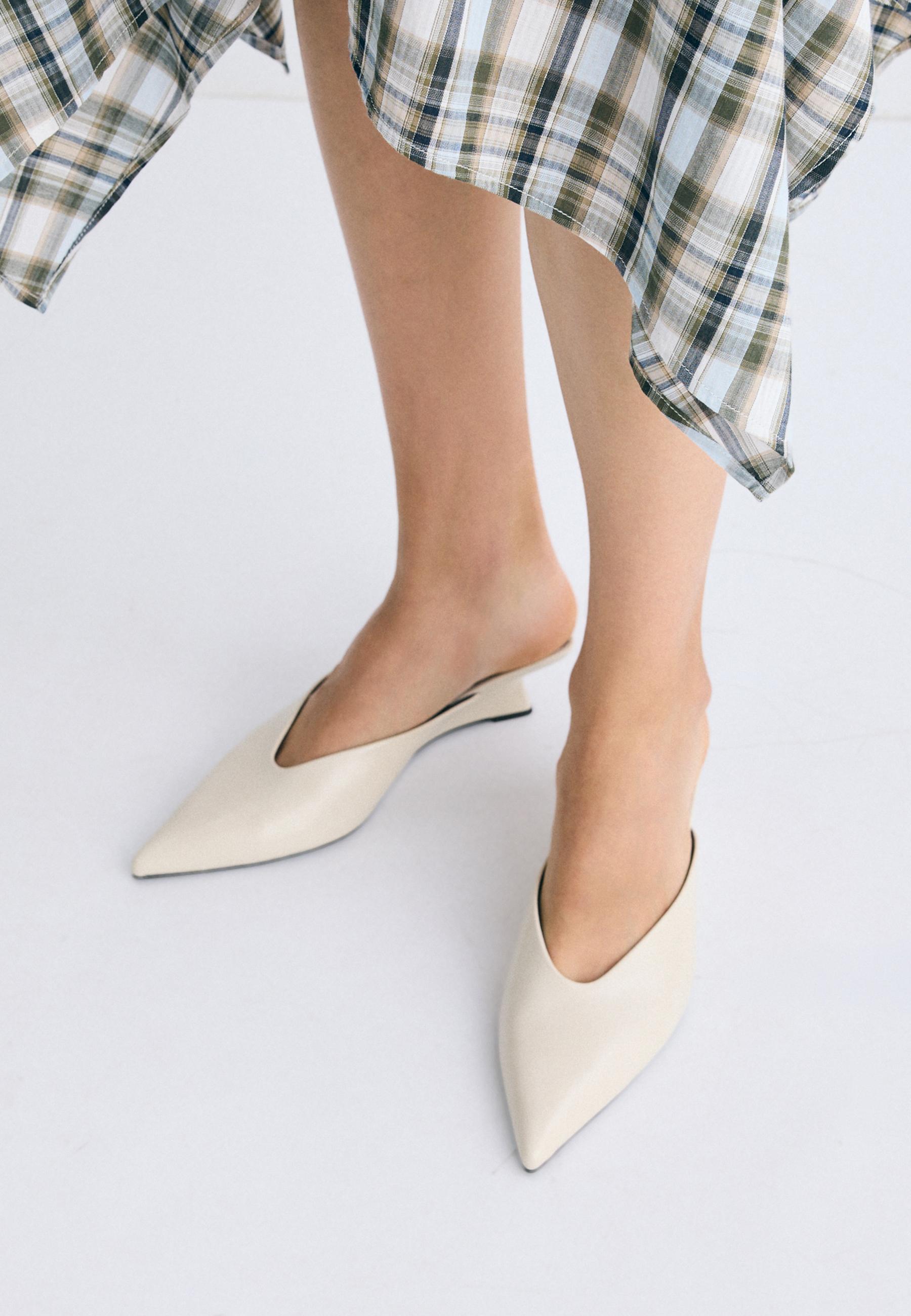 Leather effect wedge mules — ECRU