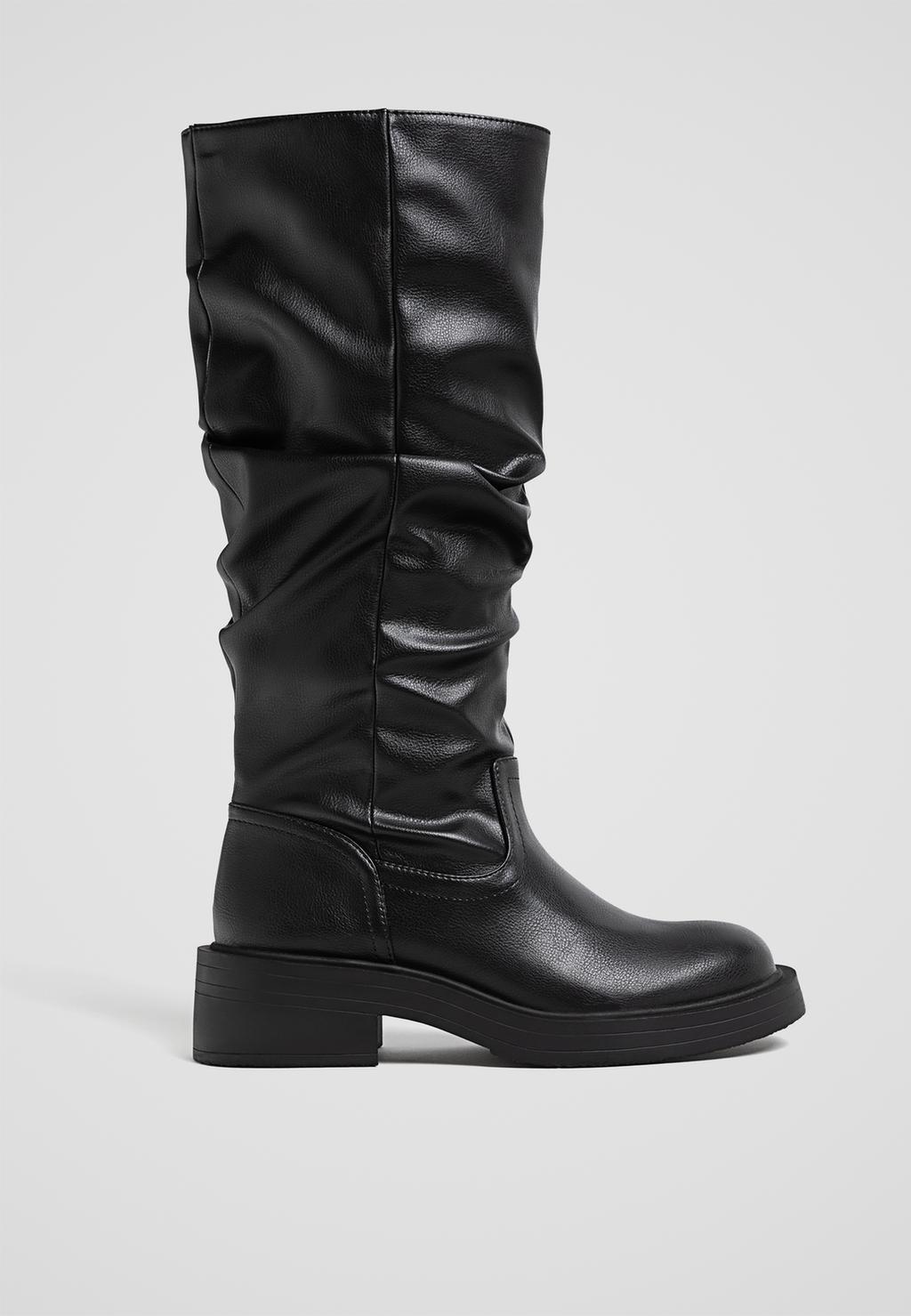 Flat slouchy knee-high boots