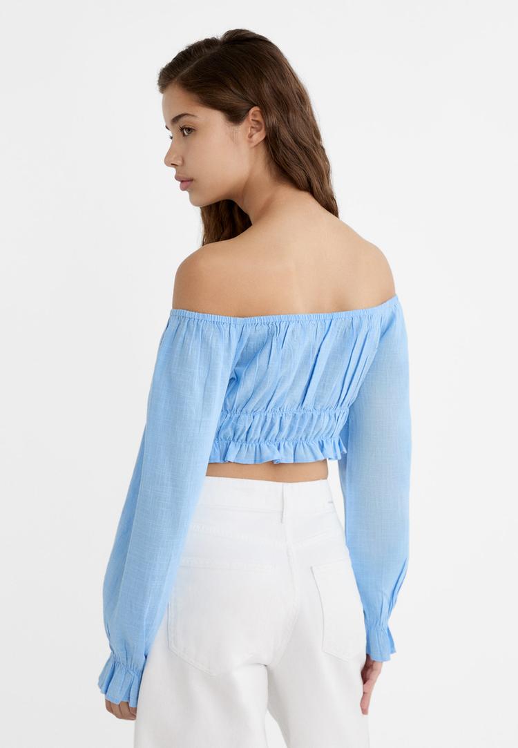 blusa com elasticos e ombros descobertos