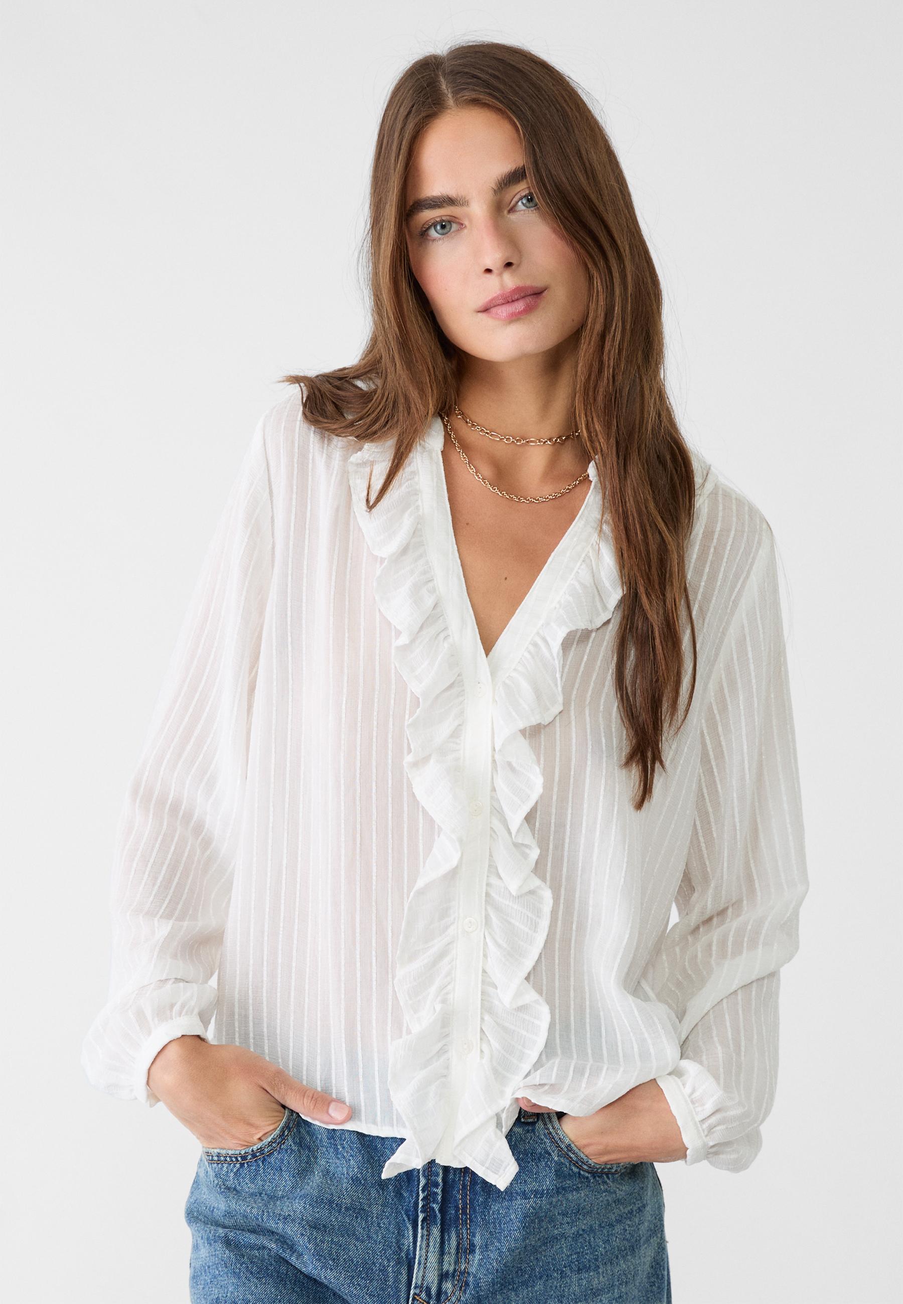 Stradivarius blusa blanca on sale