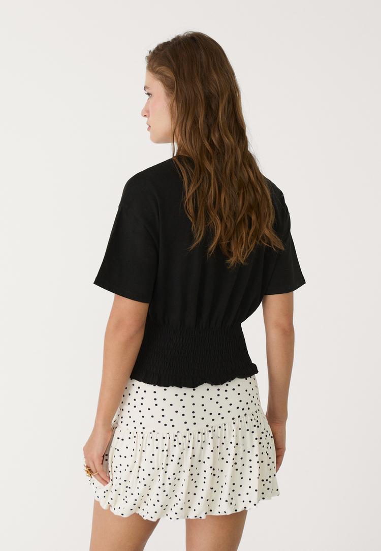 camiseta cuerpo fruncido