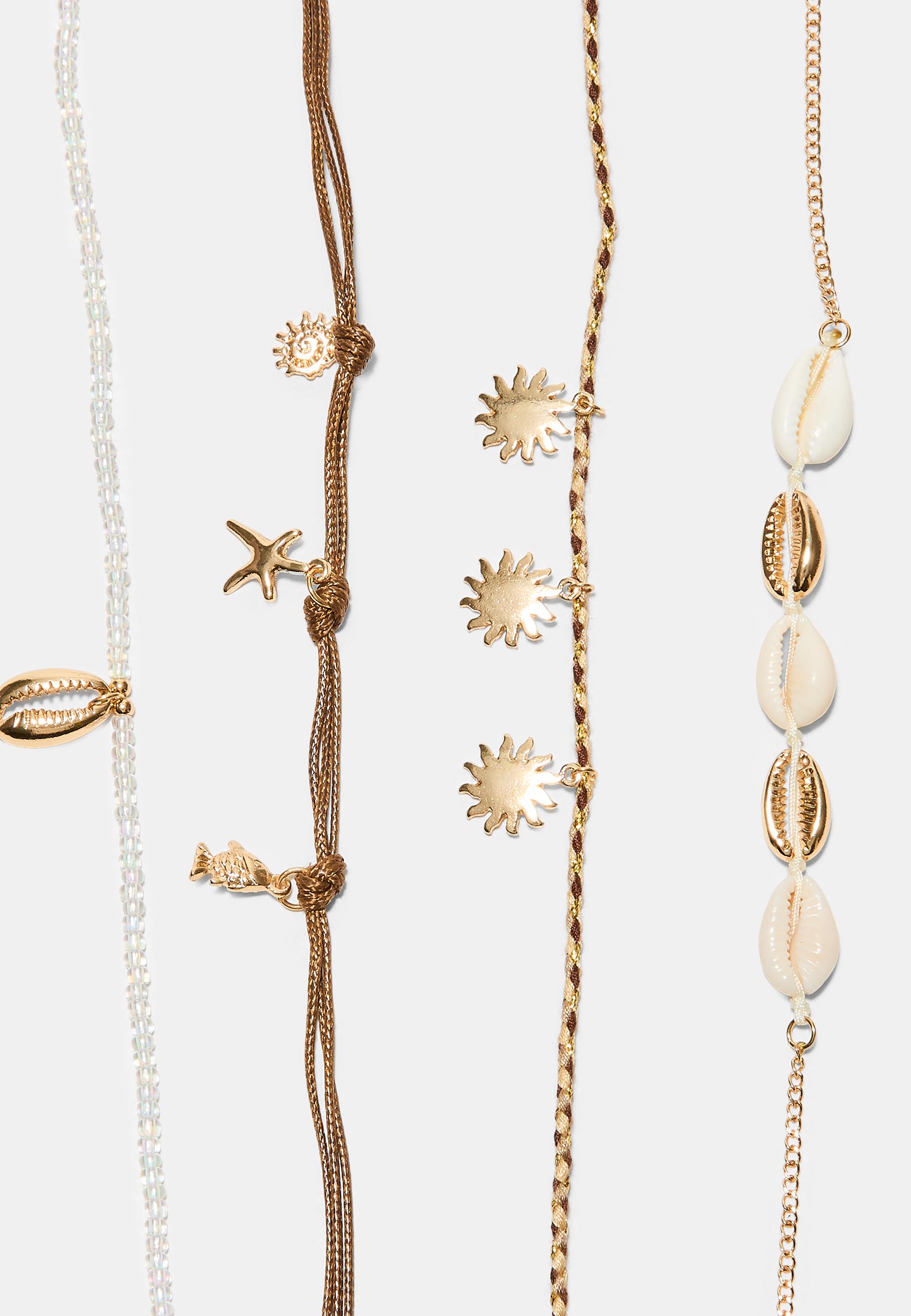 Set of 4 charm anklets — Gold