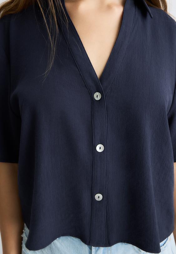 camisa fluida botones