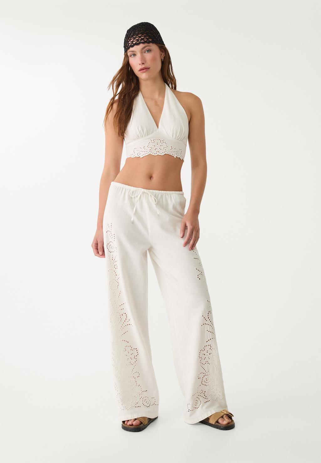 Loose-fitting linen blend trousers with embroidery
