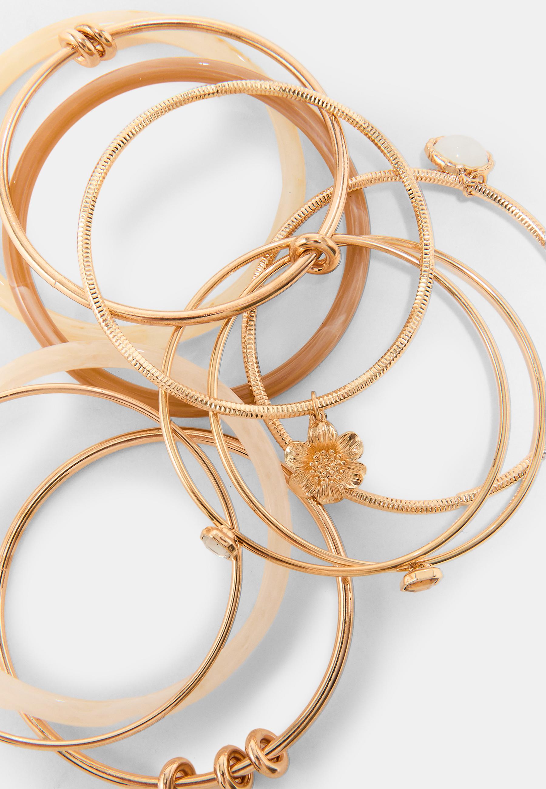 Set of 10 multi-charm bracelets — Gold