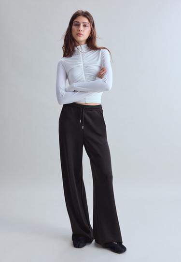 Soft-touch palazzo jogger trousers — Black 1