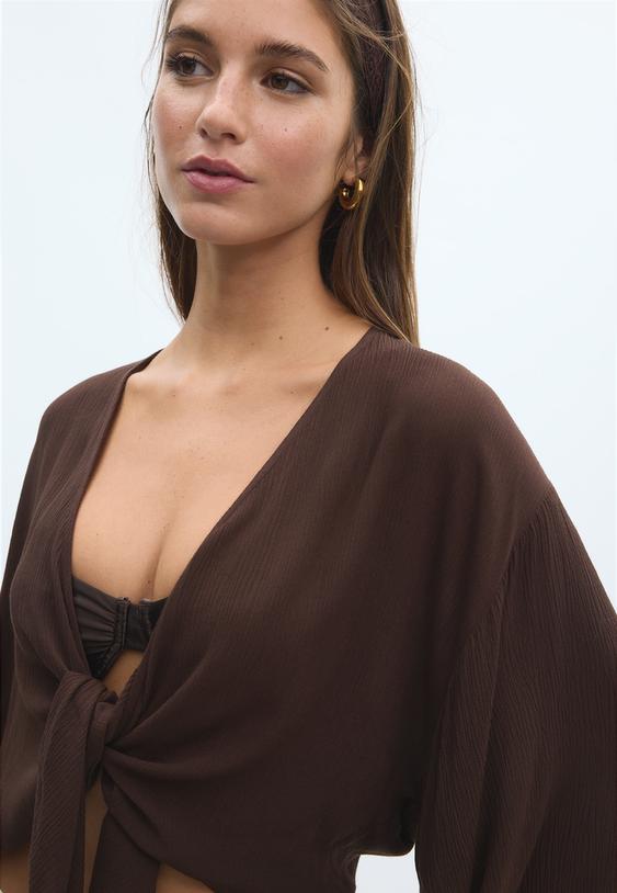 soepelvallende open blouse