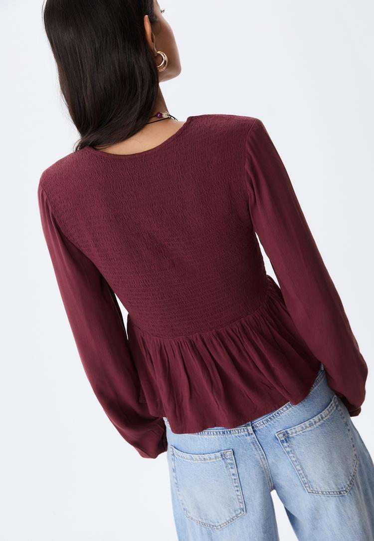 blusa fluida manga larga